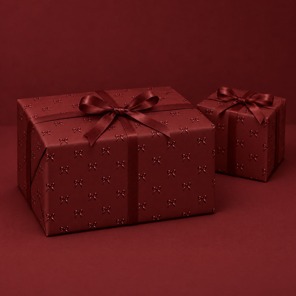 Maroon Bows Holiday Wrapping Paper by The Paper Edit, wrapped gift boxes