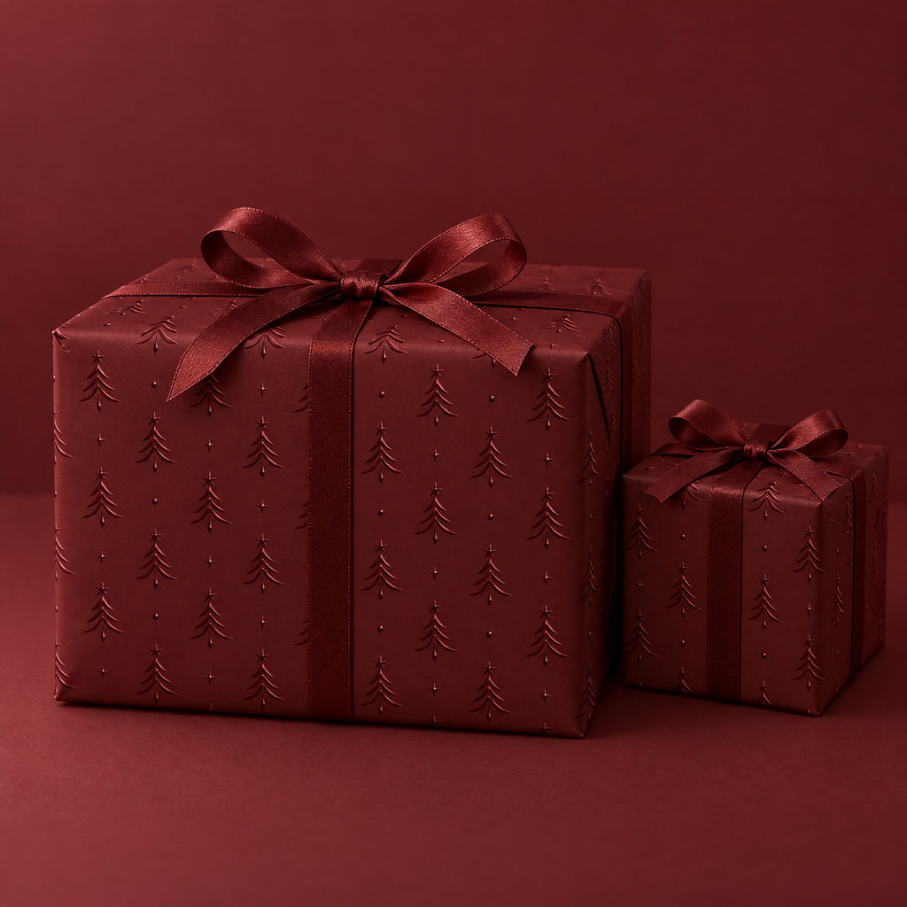 Maroon Embossed Trees Holiday Wrapping Paper by The Paper Edit, wrapped gift boxes