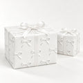 White Bows Holiday Wrapping Paper by The Paper Edit, wrapped gift boxes